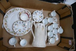 Phoenix China coffee set with peacock design (some damages)