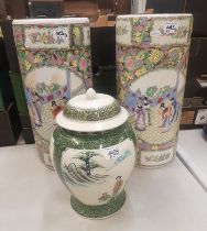 Two 20th century chinese umbrella stands together with a modern temple jar (3)