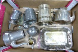A mixed collection of silver plated items to include bottle stand, teapot, desert tray, tankard with