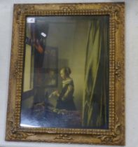 A Framed Print of Johannes Vermeer's 'Girl Reading a Letter at an Open Window'. Height: 69.5cm