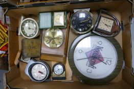 A collection of vintage travel & mantle clocks