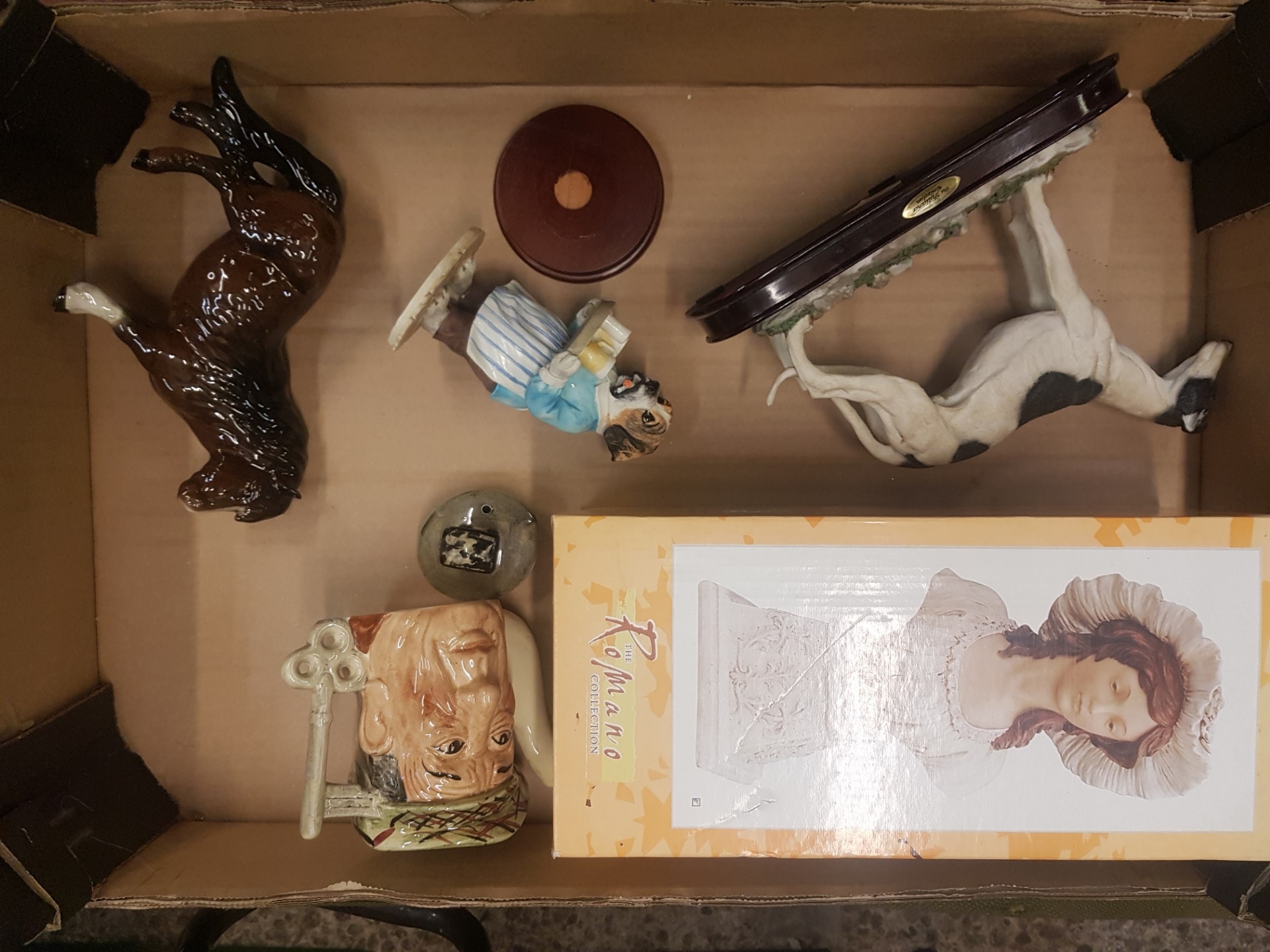 A mixed collection of items to include Royal Doulton shetland pony, siltone pottery novelty
