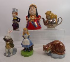 A collection of Wade figures to include Alice, Queen of Hearts, Mad Hatter, White Rabbit, Cheshire