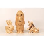 A collection of Sylvac Original models including seated dog 2951, dog with bandaged paw 1433 and