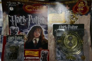 DeAgostini - Harry Potter Chess set. A set of sealed magazines and chess pieces from DeAgostini.