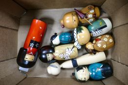 A collection of Japanese Kokeshi Dolls, tallest 18cm
