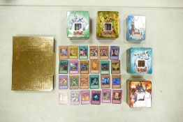 A Collection of Yu-Gi-Oh! Cards and Tins to include Opened Master Collection Binder, Five Opened