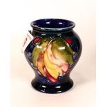 Walter Moorcroft vase decorated in the leaf & berry design, C1950s,h.8.5cm.