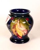 Walter Moorcroft vase decorated in the leaf & berry design, C1950s,h.8.5cm.