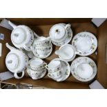 A collection of Wedgwood Mirabelle pattern tea ware to include 2 teapots, six cups & saucers,
