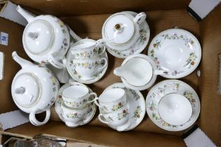 A collection of Wedgwood Mirabelle pattern tea ware to include 2 teapots, six cups & saucers,