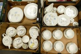 A large collection of Wedgwood Ice Rose Patterned Tea & Dinnerware including two Handled cups &