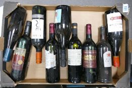 A collection of vintage wines to include Hardys Shiraz, Las rocas Cab Sav, Chateau Grand Jour