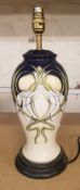 Moorcroft Galanthus pattern table lamp, designed by Rachel Bishop, height to top of fitting 38cm.