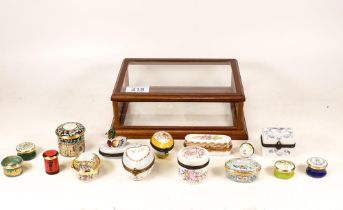 A collection of Staffordshire Enamels & similar miniature pills boxes & eggs