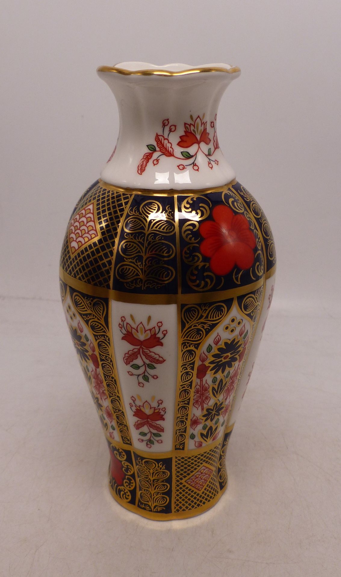 Royal Crown Derby vase in the Old Imari 1128 pattern 18cm in height.