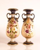 Carlton ware Ivory Blushware twin handled Baluster vases in the Hibiscus pattern with relief moulded