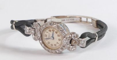 Rolex Geneve ladies diamond encrusted Art Deco cocktail watch in platinum case. In ticking order,