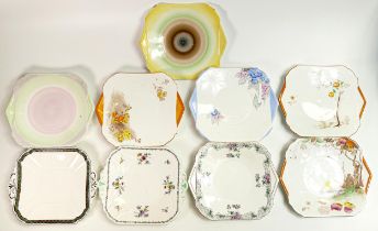 Nine Shelley tab handle square bread and butter plates. Patterns 11216, 2129, 293, 0168, 0183,