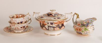 Three Georgian porcelain items of tea ware in the manner of Spode to include an Imari True trio, a