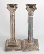 Pair of large hallmarked Corinthian column silver candlesticks, height 27cm, loaded, gross weight