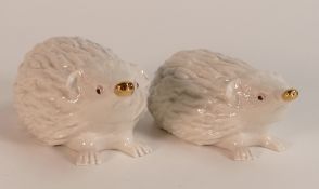 Wade mother and baby hedgehogs in white glaze and gold noses, unmarked to base. This lot was removed