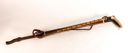 Two horn handled antique riding crops (2)