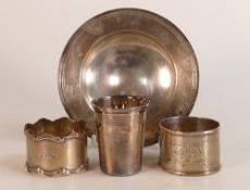 A collection of silver items including pin dish, serviette rings and tumbler, 191.4g. (4)