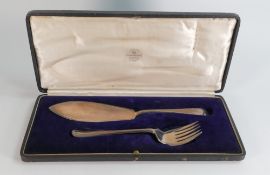 Cased pair of hallmarked silver fish server and fork, each bears a single initial, good clear full