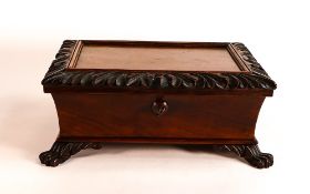 19th century Mahogany casket on lion paw feet, with polished stone internal panel to lid, length