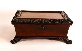 19th century Mahogany casket on lion paw feet, with polished stone internal panel to lid, length