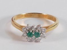 18ct emerald & diamond ring, two small emeralds surrounded by 10 small diamonds, ring size P, 3.5g.