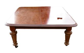 Large Victorian Mahogany extending dining table, with leaf stand & two leaves on carved & turned