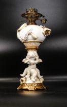 Late 19th century Moore & Co Putti figure group lamp base, impressed marks to base 652, height
