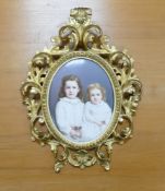 KPM porcelain oval plaque, hand painted portraits of two young girls, plaque size 22.5 x 16.5cm,