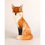 Royal Worcester model of a seated fox, h.19cm, black factory marks.