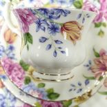 A large collection of Royal Albert Beatrice pattern tea & dinner ware to include 8 trios, 4 x rimmed