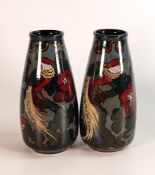 Pair of 20th century Decoro pottery vases, typically decorated with flowers, on an opalescent