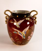 Large Carlton ware handled vase decorated with flying ducks, height 23.5cm, crazing to base.