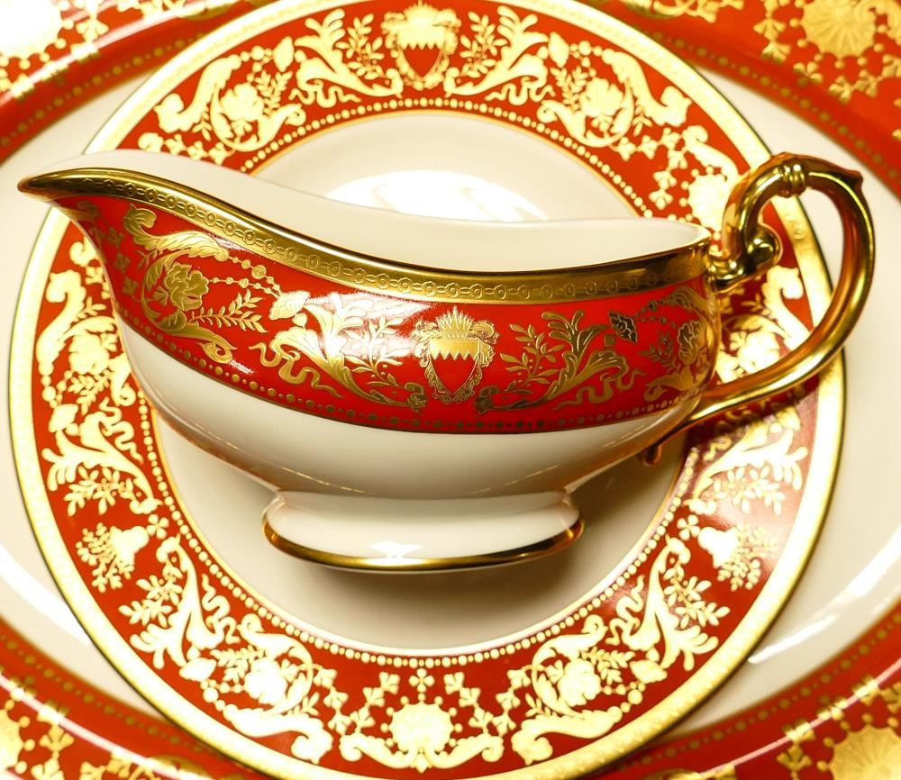 A collection of De Lamerie Fine Bone China heavily gilded Renaissance pattern tea & dinner ware to