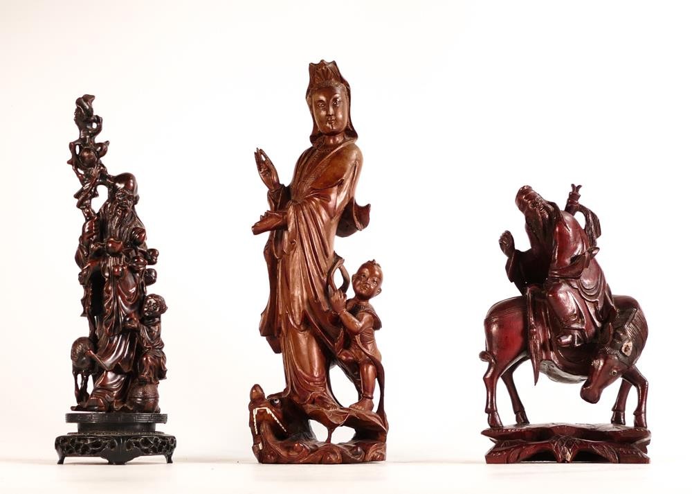 Three Chinese Deity figures to include depictions of Guanyin, Shoulao and similar figure of an
