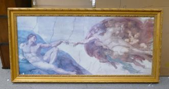 A large gilt framed print of Michelangelo's 16th century fresco painting 'Creation of Adam'. In