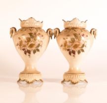 Carlton ware Ivory Blushware swan handled Baluster vases in a hand painted Hibiscus pattern with
