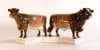 Beswick Dairy Shorthorn bull and cow mounted on ceramic base 1863. 'Presented by Dairy Farmer