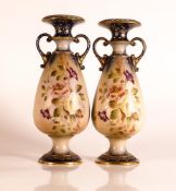 Carlton ware Ivory Blushware twin handled Baluster vases in the Hibiscus pattern with relief moulded