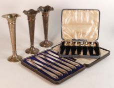 A collection of silver items including a cased set of spoons, 70.9g, set of silver handled knives