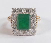 Large emerald and 14 diamond oblong cluster set in 18ct hallmarked yellow gold, head size 14mm x