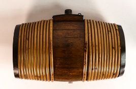 Early 20th century Willow bound Oak spirit flask of oval staved barrel form with inset glass ends,