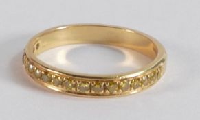 18ct gold eternity ring set with yellow stones, ring size Q, 3.5g.