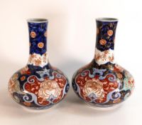 Pair early 20th century Japanese Imari patterned vases, height 29.5cm - hairline to one neck (2)